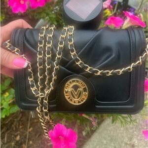 Valentino Orlandi Small
Convertible Purse/Clutch/ Crossbody Bag  New with tag